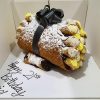 Giant Cannoli Bazooka Cake with black ribbon - cookies & creams, vanilla and rivotta